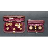 A pair of 15ct gold shirt studs, 1.