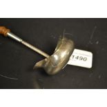 A silver toddy ladle, twin spouted bowl, gilt interior, turned wooden handle,