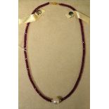 A cultured pearl and ruby necklace,