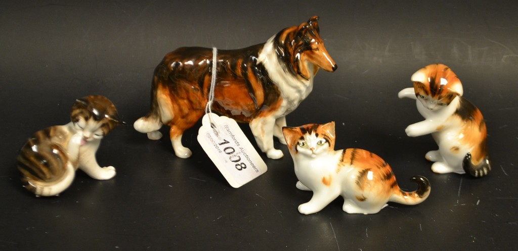 A Royal Doulton playful kitten; others similar;