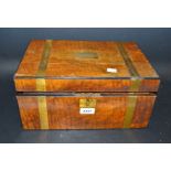 A Victorian lady's travelling writing slope, brass bound walnut case, fitted interior,