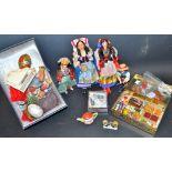 A novelty miniature doll's house shop display set, balance scales, kitchenalia,