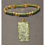 A jade set bracelet and pendant