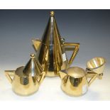 A Modernistic three piece gilded chrome tea service, tall pointed covers, ball finials,