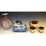 A set of three Denby bulbous jugs; an Art glass vase,