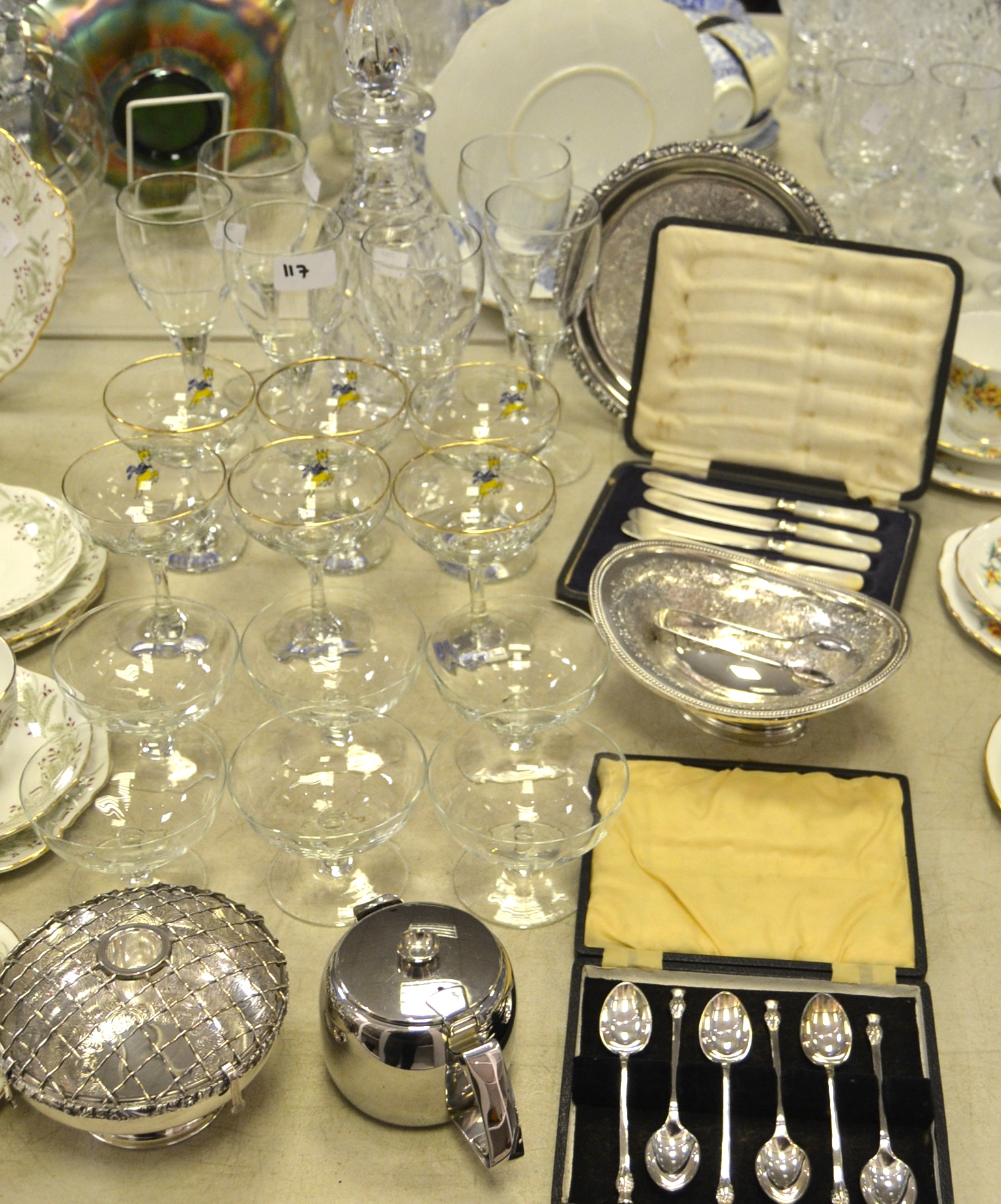A cut glass decanter; Babycham glasses, champagne coupes, wine glasses, silver plated rose bowl,