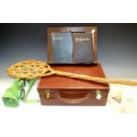 A child's leather suitcase; an oak book rest; carpet beater; a mincer; books - Longfellow;