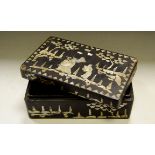 A Chinese lacquer rectangular box, profusely inlaid in mother of pearl with figures in a landscape,