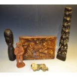 Tribal Art - an ebony carving of stacking elephants; a hardwood head; a carved interior scene;