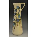 A contemporary Moorcroft Scottish Harebells pattern tapering cylindrical single handled vase,