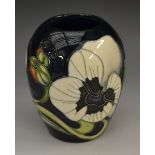 A contemporary Moorcroft miniature Miss Alice pattern ovoid vase,