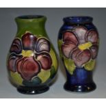 A Moorcroft miniature Clematis pattern inverted baluster vase, blue ground, green printed marks, 5.