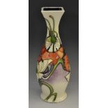 A contemporary Moorcroft Demeter pattern slender baluster vase, flared square sided neck,