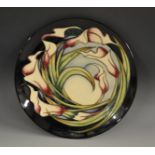 A contemporary Moorcroft Hope pattern circular plate,