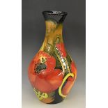 A contemporary Moorcroft Allegro Flame pattern baluster vase,