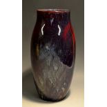 A Doulton Flambe ovoid vase, designed by Charles Noke, 23.