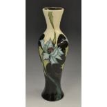 A contemporary Moorcroft Sea Holly pattern slender baluster vase,