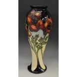 A contemporary Moorcroft Freedom Fields pattern slender inverted baluster vase,