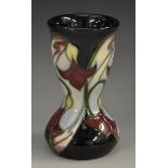 A contemporary Moorcroft miniature Dewdrop pattern gourd vase, tube lined with stylised flowers,