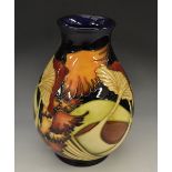 A contemporary Moorcroft Parasol Dance pattern ovoid vase, tube lined with stylised mushrooms,