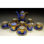 An Oriental eggshell part coffee service, blue ground,