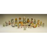 Twenty two German porcelain half dolls, various poses, c.