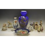 Ceramics and Glass - four Chinese figures; a blue glass vase, c.