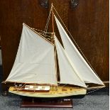 A model of a yacht at full sail, 110cm x 104cm.