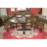 An oak pedestal dropleaf D-end dining table, turned column; four dining chairs,