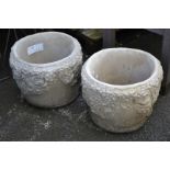 Garden ornaments - a pair of reconstituted stone planters decorated with raised flora