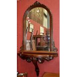 A reproduction mahogany decorative wall mirror