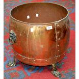 A 20th century copper log bucket, lion mask handles,