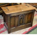 A Herbert Simpson bespoke oak blanket chest, the three quarter lid with wrought iron hinges,