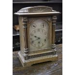 A 20th century oak dome topped mantel clock