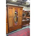 An Edwardian mahogany wardrobe, stepped cornice,
