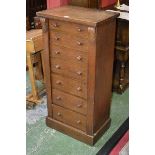 A Victorian oak and mahogany Wellington chest