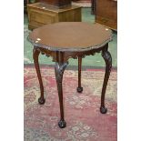 A Chippendale Revival mahogany shaped circular centre table, c.