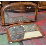 Two late Victorian arched overmantel mirrors.