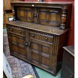 An oak court cupboard in the monastic taste,