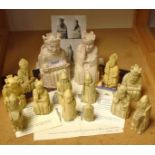 The Isle of Lewis chess pieces reproduced in ivory coloured polyester resin including king, queen,