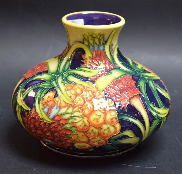 A contemporary Moorcroft Pineapple pattern compressed ovoid vase,