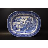 A blue and white Willow pattern meat dish,