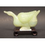 A Chinese jade goose on hardwood stand