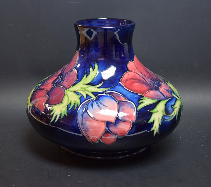 A large contemporary Moorcroft Anemone pattern compressed ovoid vase,