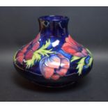 A large contemporary Moorcroft Anemone pattern compressed ovoid vase,