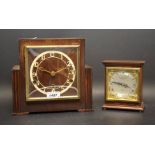 An oak Art Deco chiming mantle clock with pendulum and key; another,