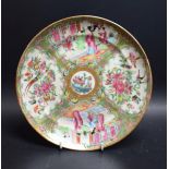 An early 19th century Cantonese plate, painted with panels of birds,