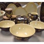 A Denby Bakewell set of three storage jars; mixing bowls; casserole dish; serving dishes; etc.