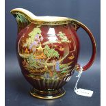 A Crown Devon Fieldings ovoid jug, rouge royale type lustre glaze, applied with pagoda,