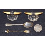 Silver - A pair of silver mounted bone knife rest; a spoon; a pickle fork;